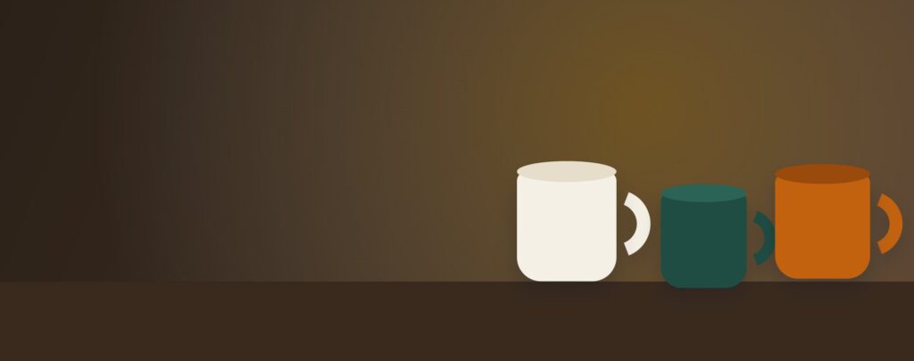 Stoneware mugs on a dark table